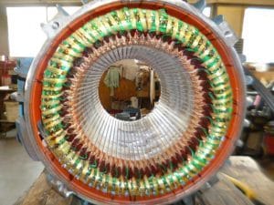 Réparation de moteur électrique en cours dans notre atelier