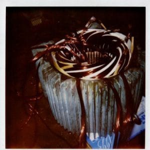 Moteur électrique en cours de réparation à Longvic Historique